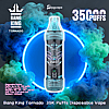 Blue promotional image featuring a central cyan-blue disposable vape labeled 'Bang King Tornado' and 'Blueberry Ice' framed by a glowing neon ring and swirling teal and blue vapor, with prominent '35K PUFFS' text, brand logos and small product specs.