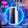 White and blue Vozol Star 20000 disposable vape with a vertical color LED display and top mouthpiece, pictured against a glowing blue ring and smoky background with on-image text noting 20,000 puffs, dual modes and capacity/battery specs.