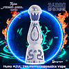 Humo Azul 24K disposable vape shaped like a white and blue decorative bottle with blue floral and laurel patterns, centered against a glowing neon-blue circular circuit background with flames and the text "24000 up to puffs".