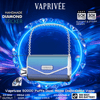 Metallic blue purse-shaped VAPRIVÉE disposable vape with a heart-link chain handle centered on a glowing faceted blue diamond ring background, surrounded by promotional text advertising a handmade diamond sticker, 50K/30K puffs dual mode, mega LED display, dual mesh coils, adjustable airflow and 900 mAh battery.