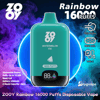 Teal ZOOY disposable vape device labeled "Watermelon Ice" centered against purple and blue smoke, showing "16000 PUFFS" and an 88% battery display, with surrounding text and icons advertising Rainbow 16000 puffs, mesh coil, Type‑C charging, 650mAh battery and 26mL e‑liquid capacity.