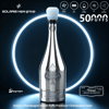 Silver champagne-style vape bottle with glowing ring, “50000 puffs” and “2% nicotine” on a dark blue ad