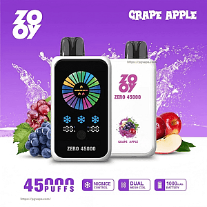 Advertisement showing two ZOOY Zero 45000 vape devices — a black-front unit with a colorful circular display and a white-back unit branded 'ZOOY ZERO 45000' with a grape-and-apple illustration — on a purple background with grapes, apple halves and water splashes and text highlighting 45,000 puffs, nic & ice control, dual mesh coil and 1000 mAh battery.