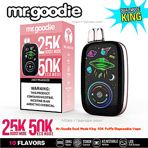 Mr. Goodie Dual Mode King engångsvape och dess rosa förpackning, som visar en svart oval enhet med neon-UFO-tema och cirkulär LED-display, och boxen som annonserar 25K Boost Mode/50K Eco Mode, Juicy Peach Ice-smak och en nikotinvarning.