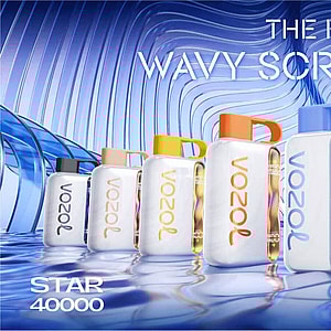 Row of colorful Vozol Star 40000 handheld devices with distinctive vertical wavy illuminated screens and loop handles, reflected on a rippling water-like surface against a futuristic blue wavy architectural background and a large headline reading “The First Wavy Screen Ever”.