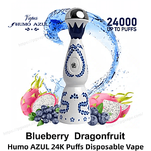 White ceramic-shaped Humo Azul disposable vape with blue floral decoration and a metallic top centered against a swirling blue water splash, surrounded by dragonfruit halves and blueberries and labeled 24,000 puffs and Blueberry Dragonfruit flavor.