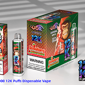 Colorful UOR Crystal 12000 12K Puffs Strawberry Watermelon disposable vape packaging and device, featuring a cartoon monkey mascot on green-pink boxes.