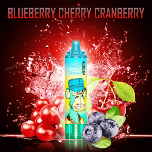 Teal disposable vape device labeled Tornado with an illustrated angry monkey in front of splashing red liquid and clusters of blueberries, cherries and cranberries, under a bold headline reading BLUEBERRY CHERRY CRANBERRY.