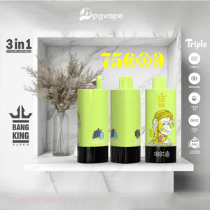 Three lime-green cylindrical disposable vape devices with black bases and small fruit illustrations displayed on a white marble shelf in front of a glass vase of dried grasses, with bold yellow 