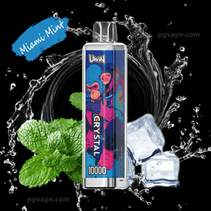 Close-up of a Uwin Crystal disposable vape showing vibrant neon monkey artwork and a '10000' puff label, set against a black background with fresh mint leaves, ice cubes, a water splash and a 'Miami Mint' banner