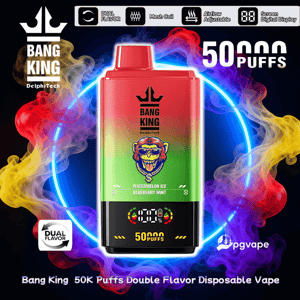 Colorful red-to-green disposable vape device labeled BANG KING with a grinning monkey logo and text 'Watermelon Ice / Blueberry Mint' and prominent '50,000 puffs', shown against a glowing neon ring and swirling multicolored smoke with icons indicating dual flavor, mesh coil, adjustable airflow and a digital screen.