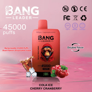 Red Bang Leader disposable vape device with a stylized monkey-in-hood logo and digital display reading 45000 puffs, advertised as dual-flavor Cola Ice and Cherry Cranberry against a pink background with ice cubes, soda splash, cherries and certification icons.
