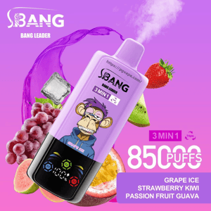 Purple disposable vape device branded BANG Bang Leader with a cartoon bored monkey, labeled 85,000 puffs and 3-in-1 grape ice/strawberry kiwi/passion fruit guava, surrounded by grapes, a strawberry, kiwi, passion fruit and an ice cube on a bright purple background