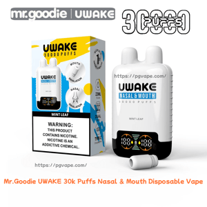 White UWAKE 'Nasal & Mouth' disposable vape with dual top nozzles and a small digital display, shown next to its blue-and-yellow Mint Leaf 30,000-puff packaging bearing the Mr. Goodie logo, nicotine warning label, and a detached mouthpiece.