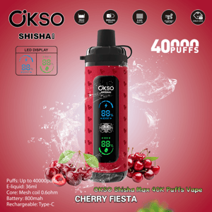 Red OKSO Shisha Max vape device with a black mouthpiece and vertical LED display showing battery and mode icons, set against splash effects with clusters of cherries at the base and prominent 40,000 puffs and Cherry Fiesta product labeling.