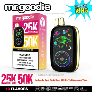 Packaging and black Mr. Goodie Dual Mode King disposable vape featuring colorful space-themed artwork with a green UFO and planets, a circular LED-style display, and a pink-yellow box advertising 25K boost/50K eco modes, Mango Pineapple Ice flavor and a nicotine warning.