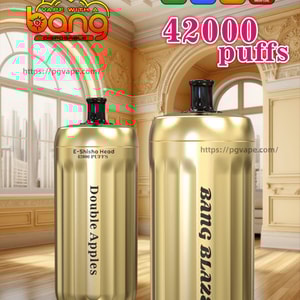 Two gold metallic cylindrical disposable vape devices with black mouthpieces labeled “Double Apples” and “BANG BLAZE” displayed in an ornate sunlit room, with promotional text and icons noting BANG BLAZE, 42,000 puffs, Type‑C charging, 1000mAh battery, 30ml e‑liquid and 0.6Ω mesh coil.