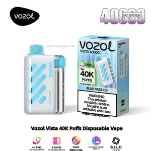 Vit och ljusblå Vozol Vista engångsvape-enhet med en genomskinlig sidopatron som visas bredvid lådan märkt 'Vozol Vista 40000' och '40K puffar', smaken 'Blue Razz Ice' och en nikotinvarning.