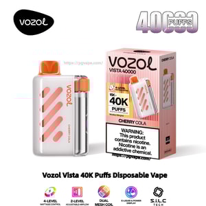 Vozol Vista 40K Puffs engångsvape-enhet i vitt med diagonala rosa-orange accenter, en genomskinlig sidotank och orange munstycke placerad bredvid dess rosa-randiga 'Cherry Cola'-låda som visar 'Vozol Vista 40000', '40K puffs'-märke och en nikotinvarning.