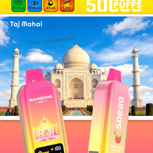 Two gradient pink-to-yellow BangKing City vape devices stand on a pink reflective surface with the Taj Mahal in the background.