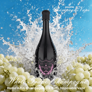 Black champagne-bottle–shaped disposable vape with a pink decorative label reading White Grape Champagne, splashing through water amid clusters of pale green grapes against a bright blue background.