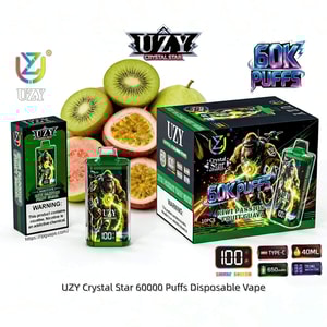 UZY Crystal Star 60000 Puffs disposable vape with a green bottle and matching box, Kiwi Passion Fruit Guava, set against sliced kiwis and passion fruits.