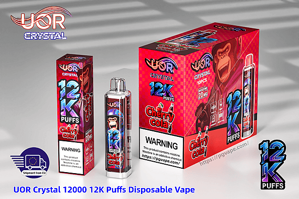 UOR Crystal 12K Puffs Cherry Cola disposable vape set with pink checkered packaging, a cartoon gorilla on the box, and a transparent device.