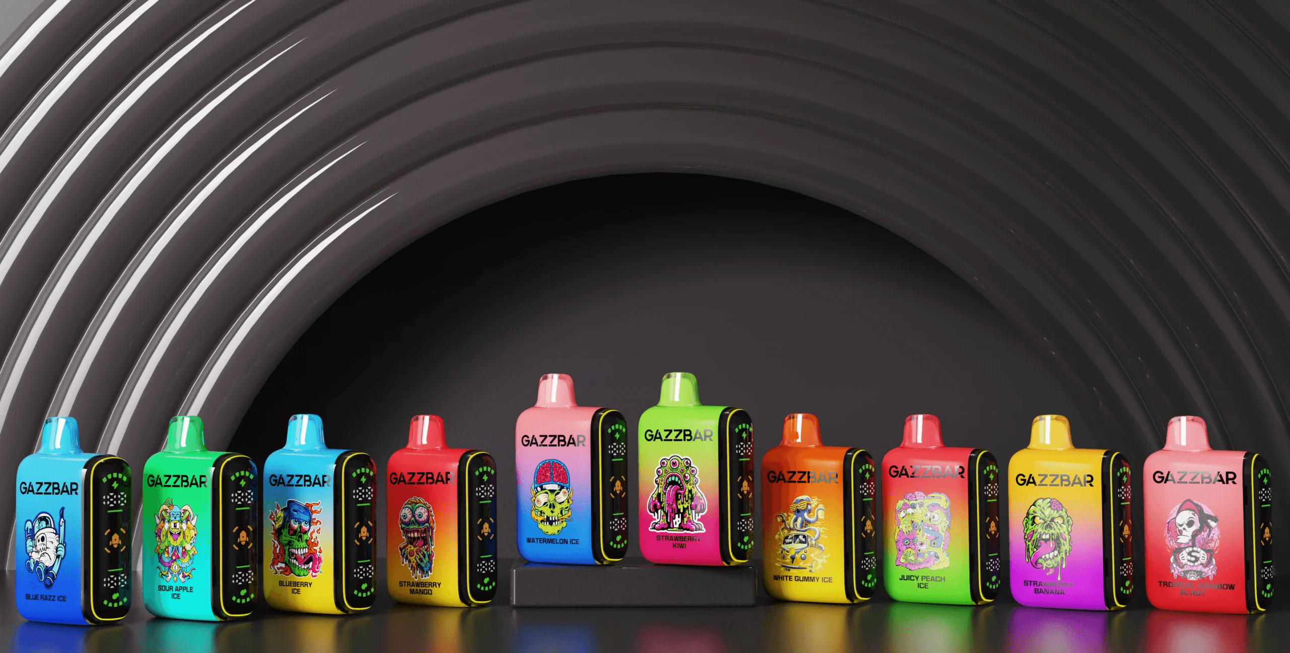 Row of brightly colored GAZZBAR disposable vape devices with gradient finishes and quirky cartoon flavor labels, arranged on a low black platform in front of a large dark arched backdrop.